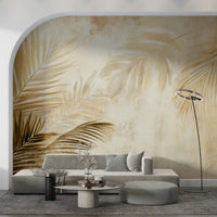 A tropical wallpaper showcasing elegant gold-toned palm leaves for a rich, serene ambiance.
