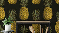 Golden pineapples wallpaper with tropical pattern

