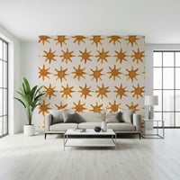 Sunny-toned brushstroke wallpaper adding a cheerful, artistic touch.