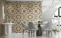 Modern geometric wall mural with layered triangles in shimmering golden and neutral shades.