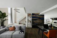 A minimalist interior with the ocean-themed wallpaper.

