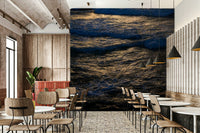 A living room featuring the coastal wall mural.

