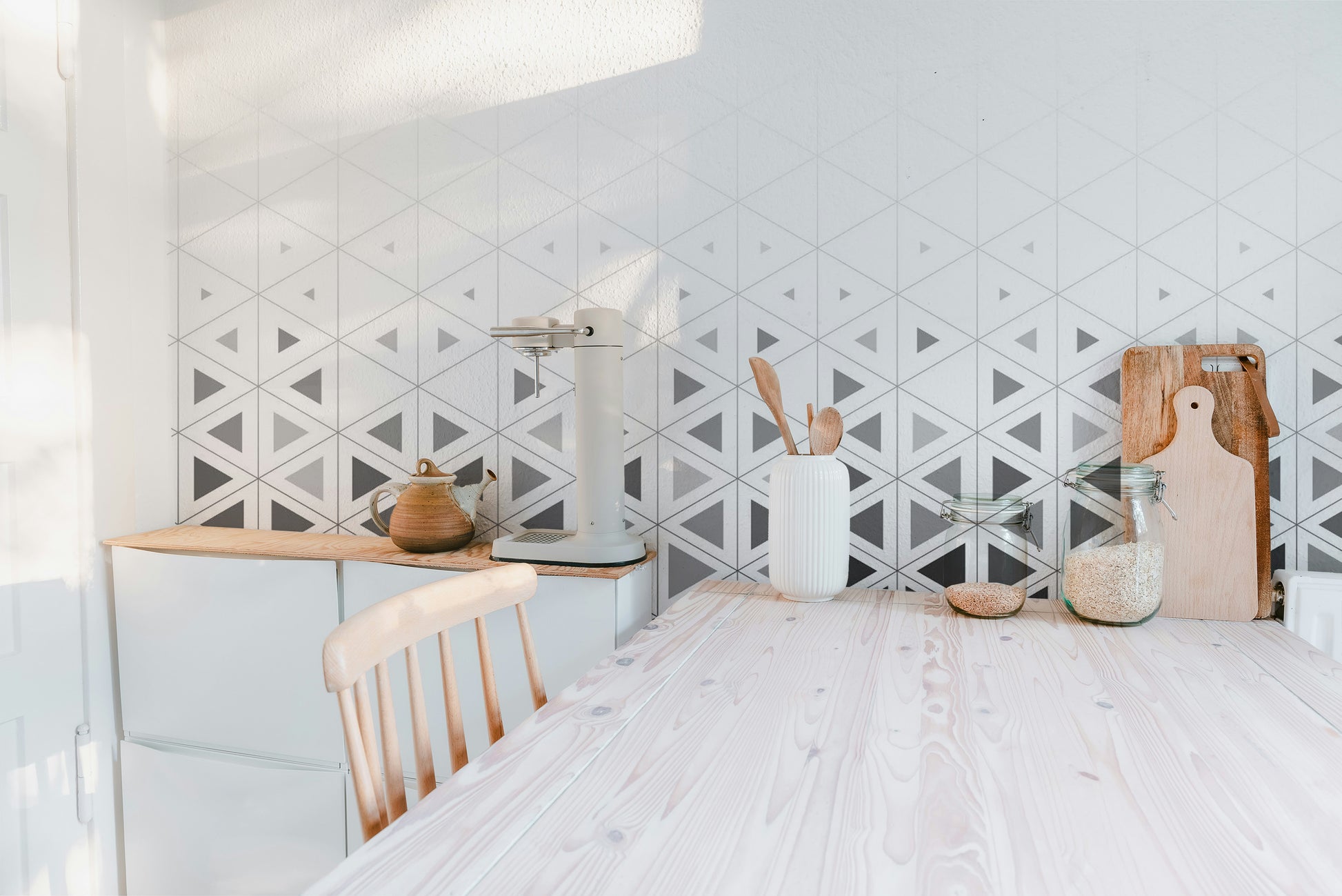 Scandi-style wall mural showing soft pastel circular motifs.