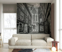 A graceful subtle shadow wall mural in cool, dark tones.

