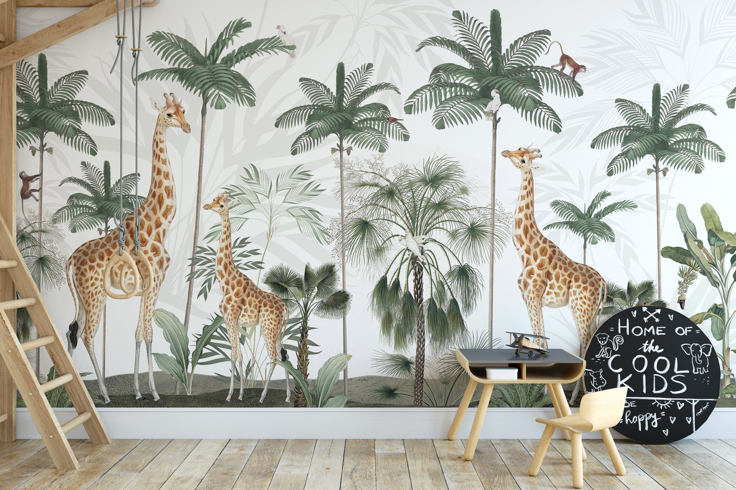 Gracious Giraffes wallpaper with palm trees behind a Cool Kids chalkboard and small wood desk