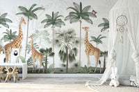 Gracious Giraffes wallpaper jungle scene in a nursery with a white play desk and canopy teepee