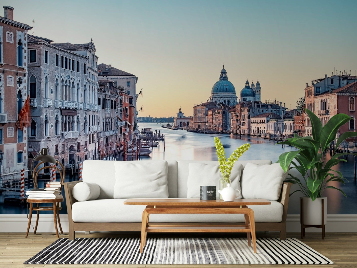 Canal wall mural behind bed, modern bedroom styling in soft colours