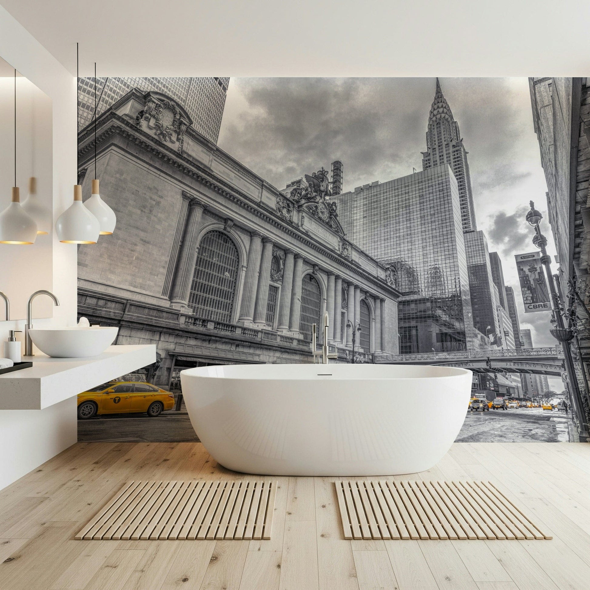 Grand Central Terminal mural in a bathroom with a white freestanding tub and wood slat bath mats