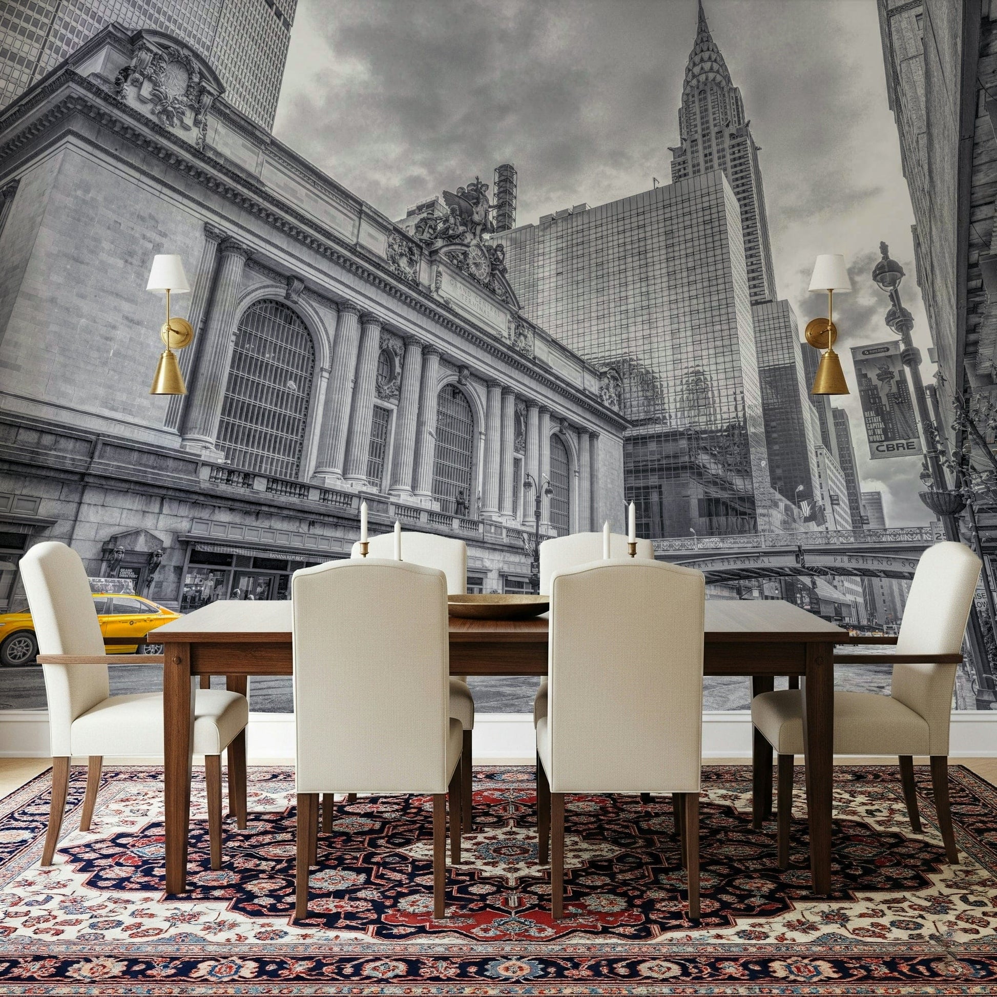 Grand Central Terminal mural over a wood dining table and cream chairs on a red Persian rug
