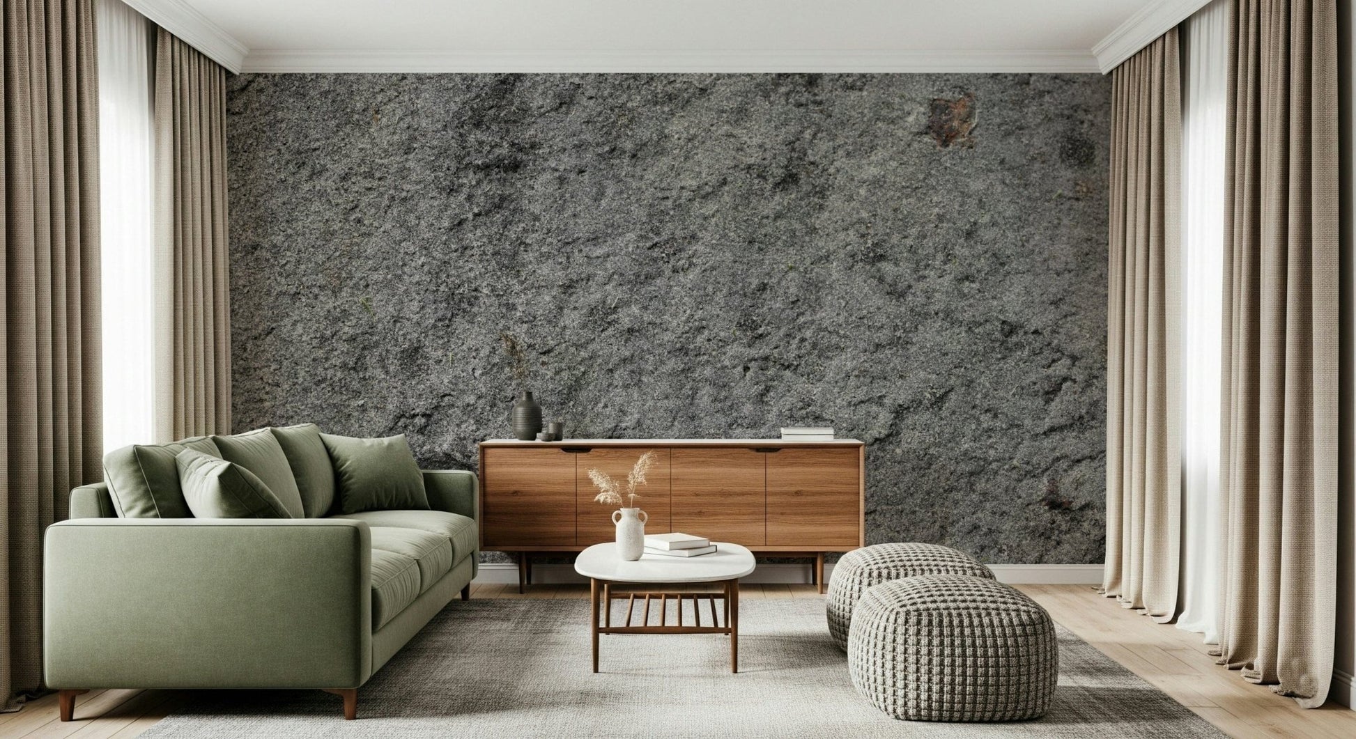 Granite Gray wallpaper mural behind a green sofa and walnut sideboard with two grey poufs