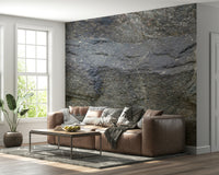 Decorative mural featuring smooth stone patterns resembling natural granite surfaces.