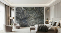 Nature’s Rock Wall Mural in reading nook, modern chair, warm lighting, textured backdrop