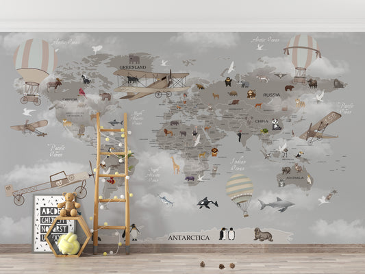 Gray World Map Kids Room wallpaper with animals and vintage planes beside a wooden ladder shelf and ABC toys