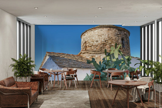 A beautiful island chapel wallpaper mural on a seaside cliff.

