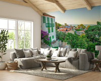 A beautiful panoramic wall mural of a coastal village.

