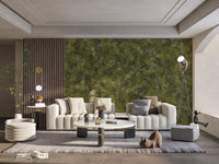 Green Embroidery Ferns Bracken wallpaper mural behind cream channel-tufted sofas and a round marble coffee table