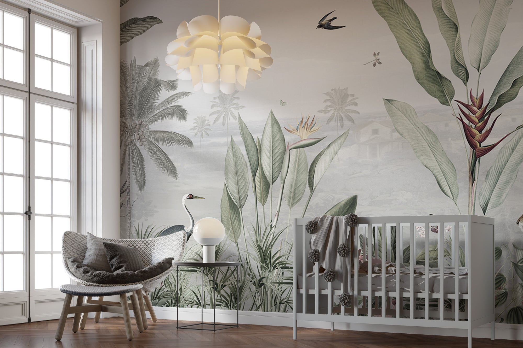 Green Forest Birds wallpaper mural with palms and a crane behind a grey crib and rattan chair in a nursery