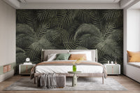Green Rustic Tropical Palms wallpaper mural styled as a feature wall behind a dining table and chairs in green tones