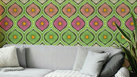 Features large, stylized daisy flowers.
