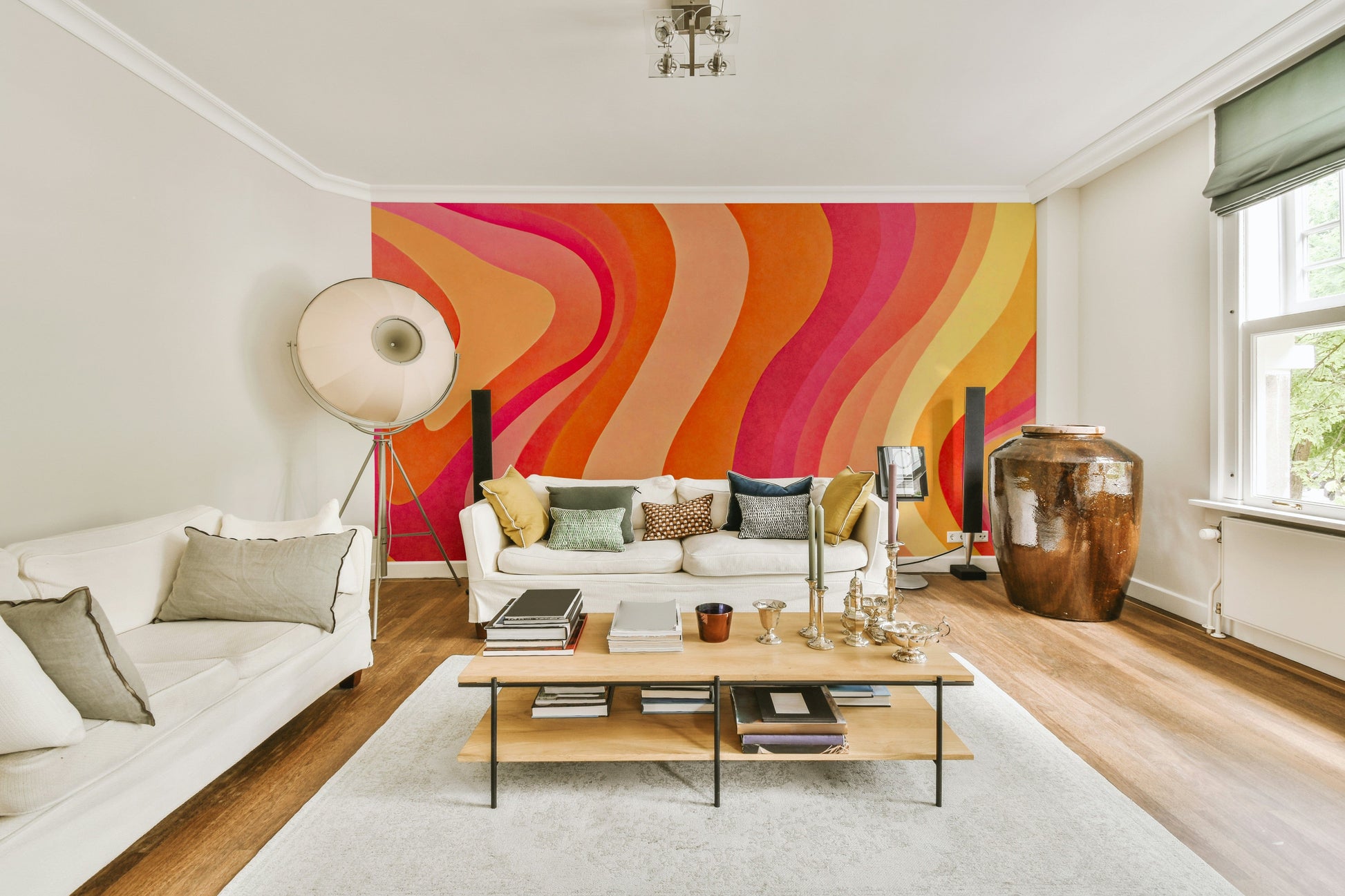 A wall mural with a pattern of wavy, flowing lines.
