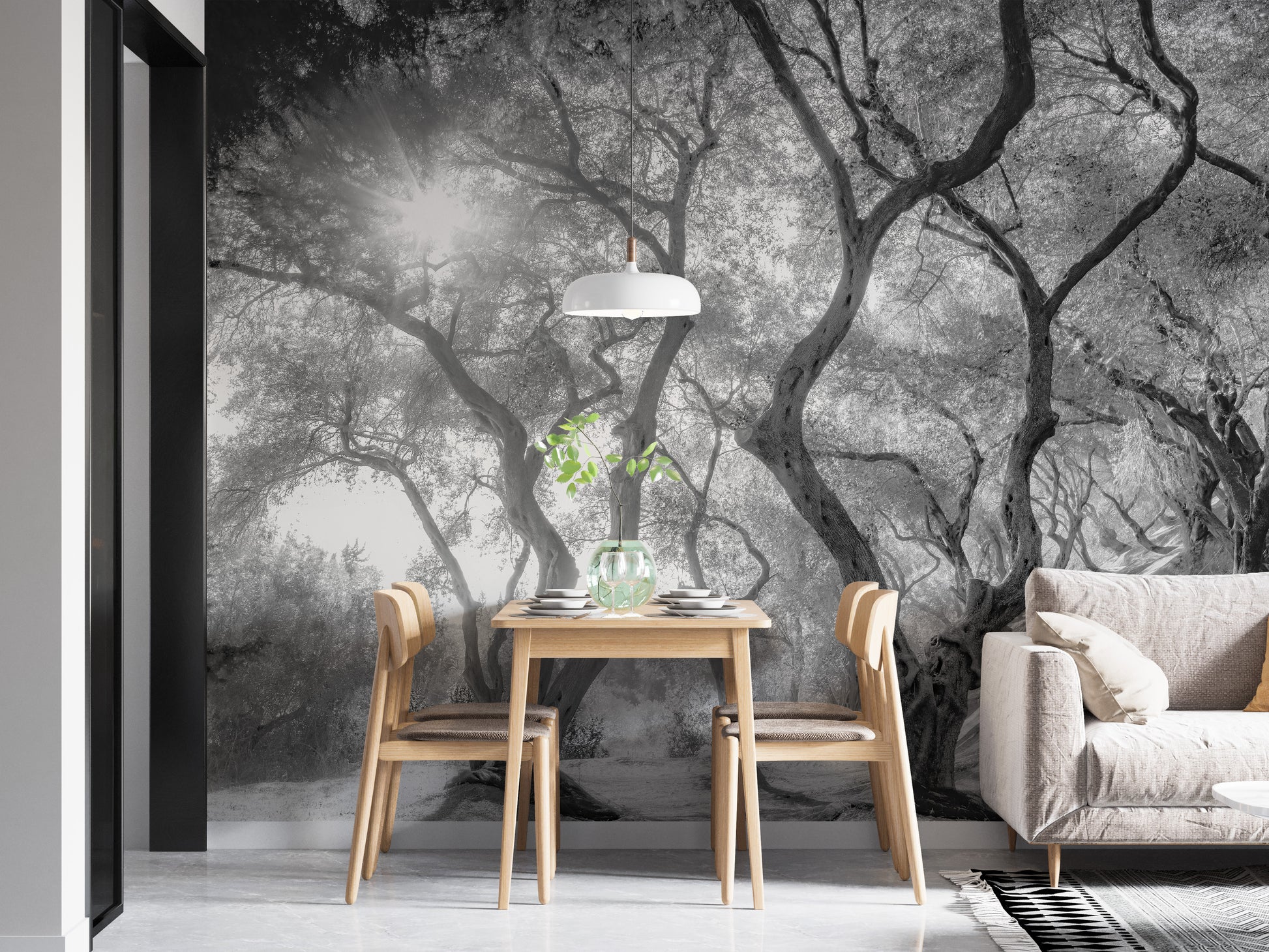 Black & White Natural Olive Groves Forest wallpaper mural styled as a feature wall behind a dining table and chairs