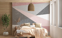 Abstract Nordic bedroom wall mural with overlapping textured triangle patterns.