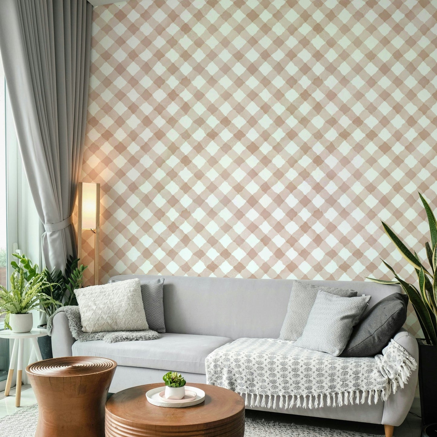 Cozy hand-painted pink gingham wallpaper creating a welcoming atmosphere

