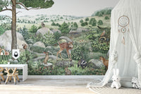 Happy Hills wallpaper mural showing a fawn, fox and owls in a nursery with a white canopy and Miffy bunny lamp