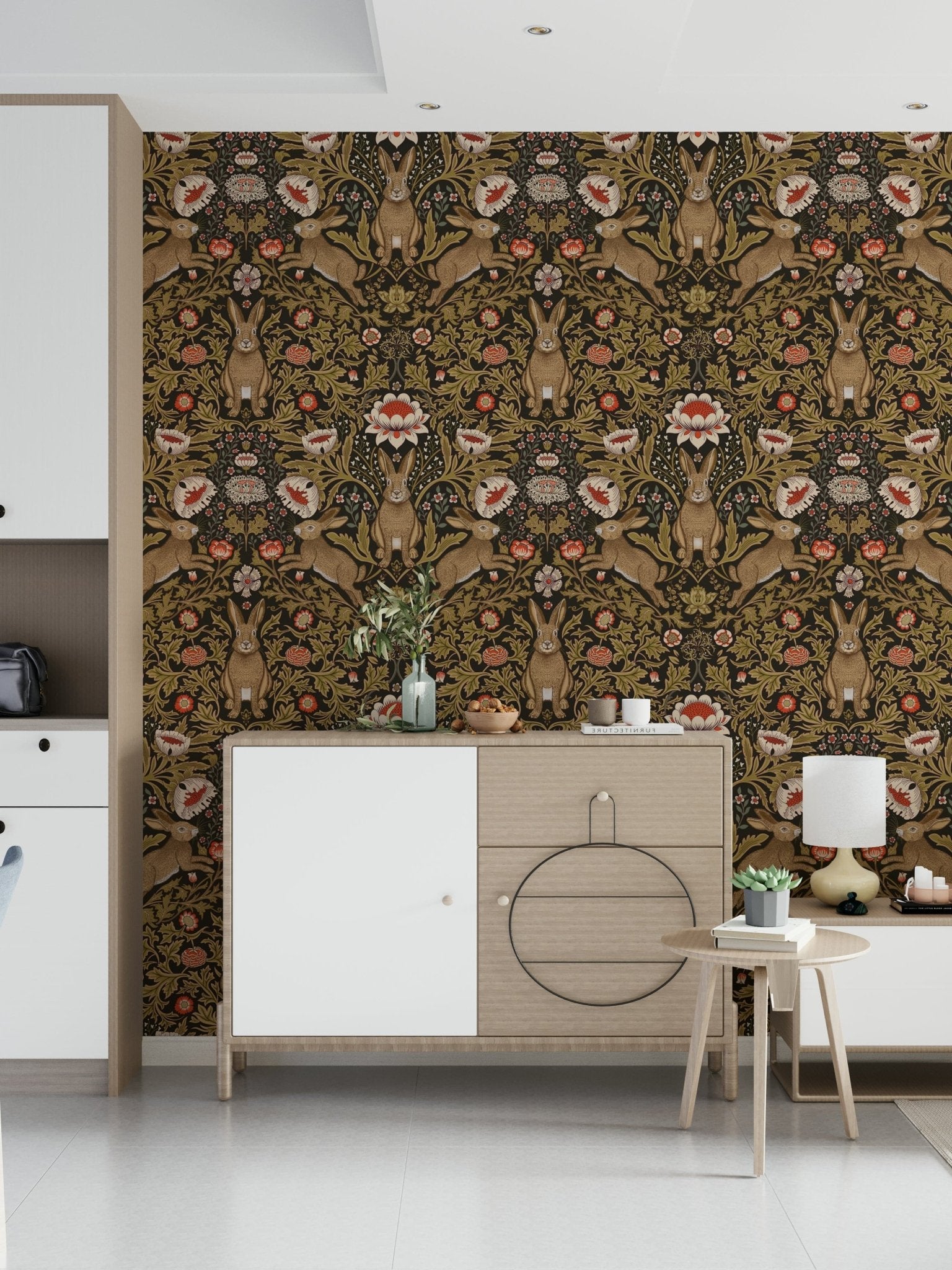 Hare & Bloom wallpaper in brown and gold behind a wood and white sideboard with a lamp in a bright hallway