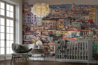 The image features buildings in a variety of bright colors.

