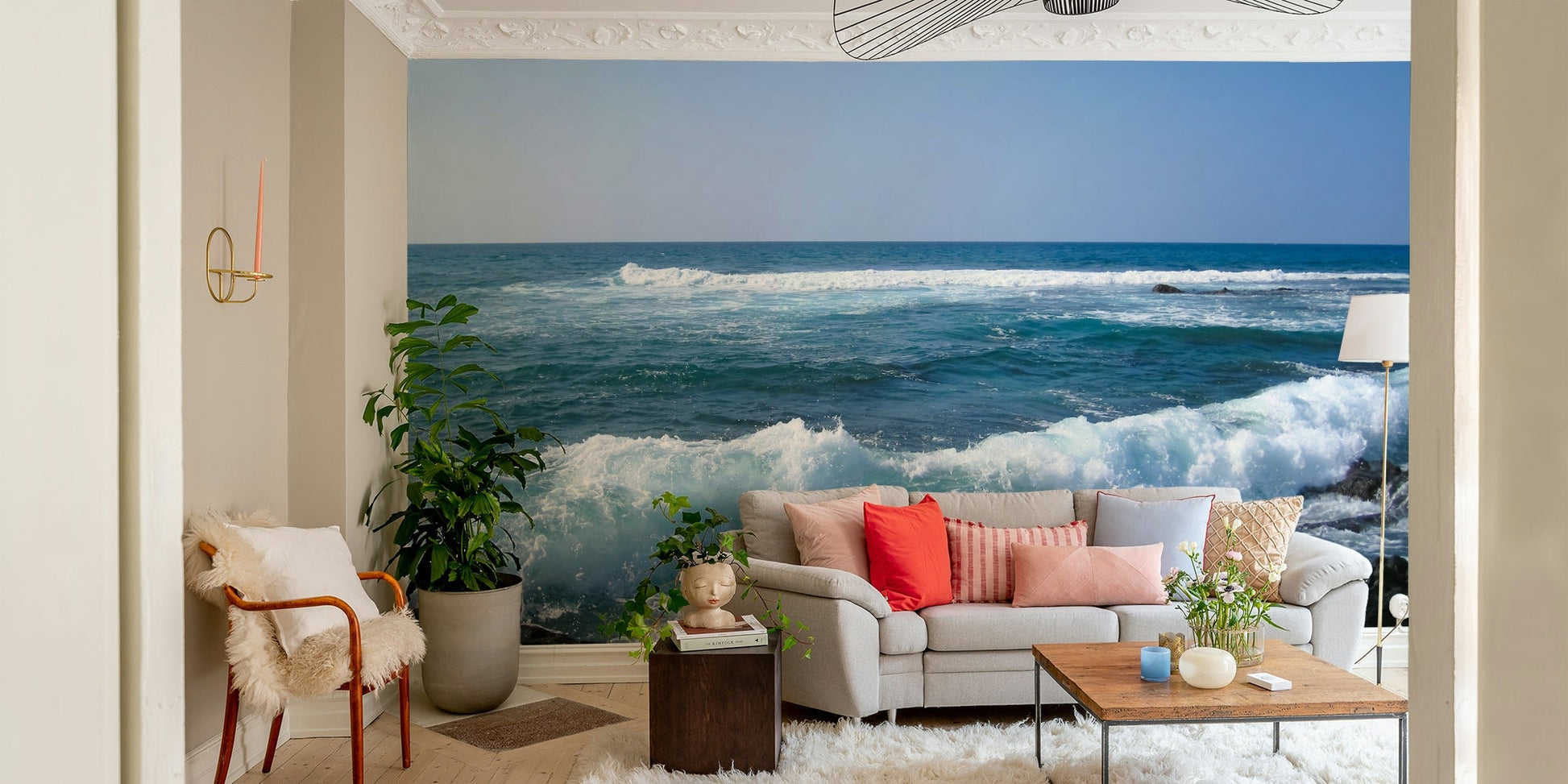 Turquoise waves crashing against volcanic rocks

