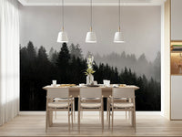 Intense forest wall mural, inky woodland under a pale sky.