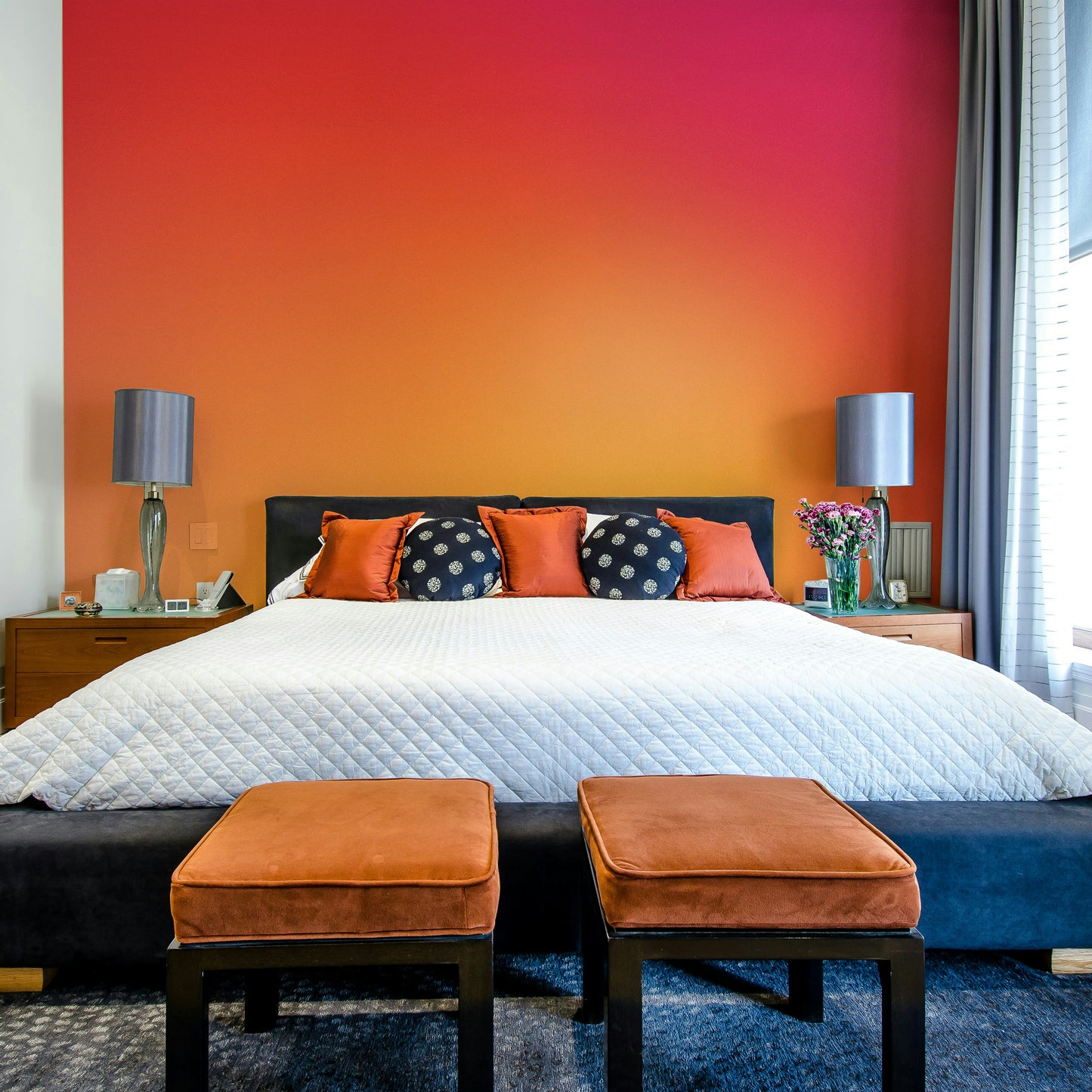 Warm gradient wall mural with hot pink and orange hues.

