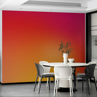 Colorful gradient wall mural transitioning from hot pink to orange.

