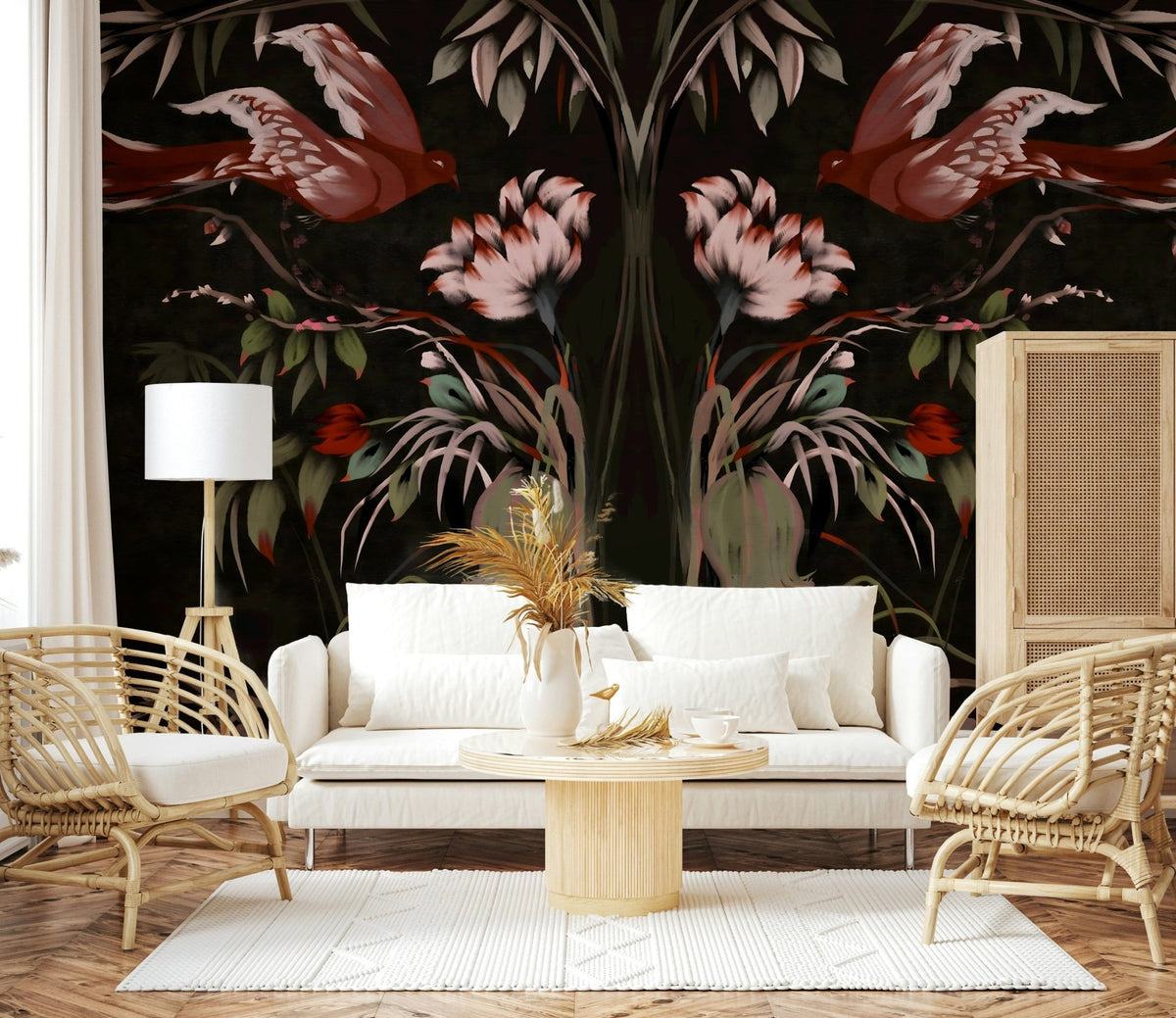 Heaven's Birds Joseon wallpaper mural of red birds and pink flowers on black behind a white sofa and rattan chairs