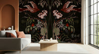 Heaven's Birds Joseon wallpaper mural of dark Korean florals and birds behind a grey sofa with rust cushions
