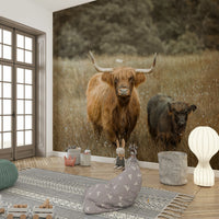 Serene nature scene mural with Highland cows in a peaceful setting.

