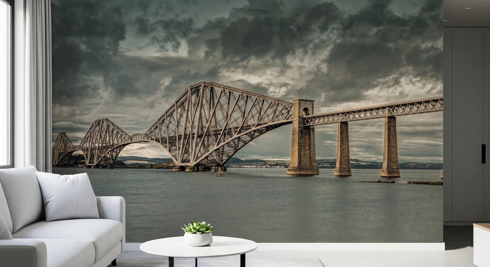 Historic Forth Rail Bridge wall mural shown nearly full-wall beside a white living room sofa