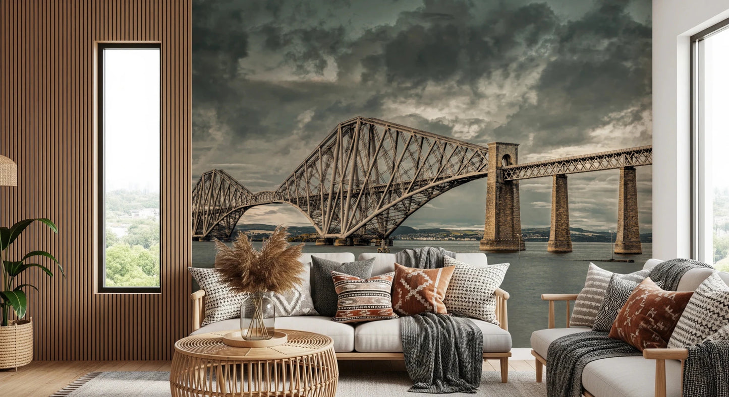Historic Forth Rail Bridge wall mural behind a cream sofa with boho patterned throw pillows