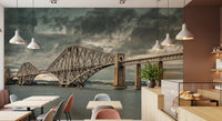 Historic Forth Rail Bridge wall mural spanning a cafe wall above small tables and pastry counter