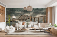 Historic Forth Rail Bridge wall mural behind a cream sofa with sphere pendants and floor lamp