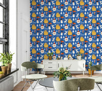 Playful Christmas icons scattered across a blue holiday wallpaper filled with Santa, trees, and candy canes.