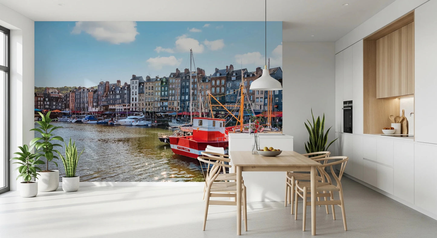 Honfleur Harbor Charm wallpaper mural of the harbor and red boat in a kitchen with a wood table and wishbone chairs