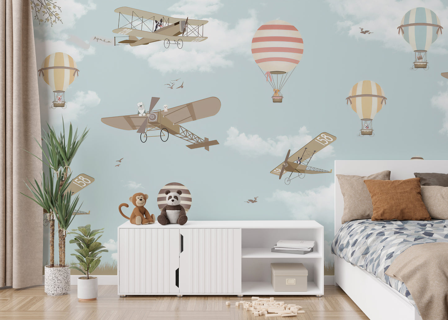Hot Air Balloons & Planes Fun land wallpaper mural as a feature wall in a home office workspace in blue tones
