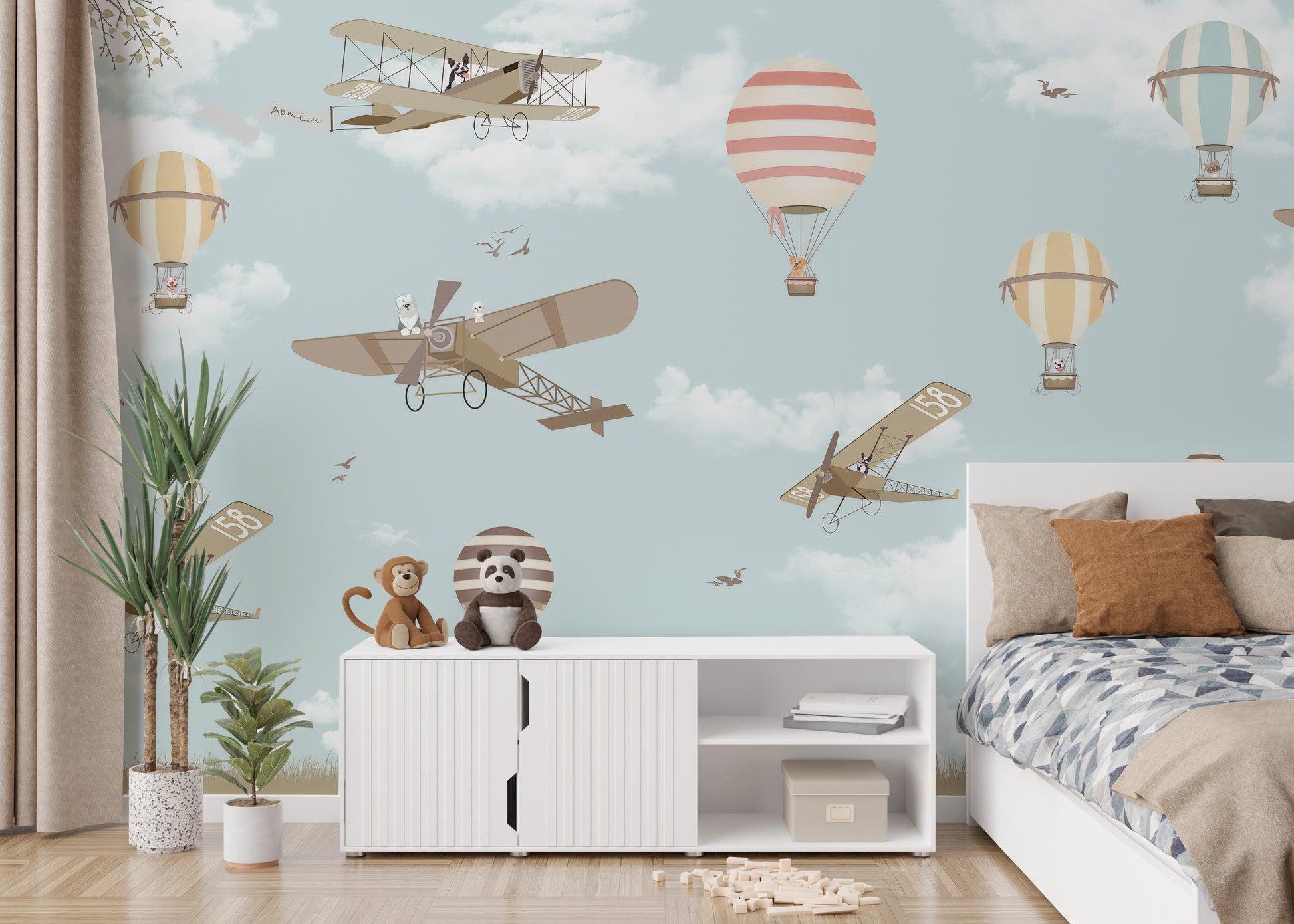 Hot Air Balloons & Planes Fun land wallpaper mural as a feature wall in a home office workspace in blue tones