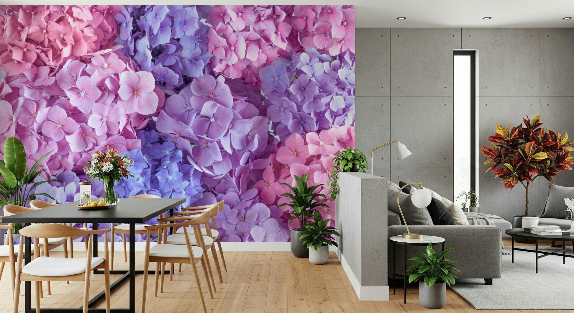 Hydrangea Hues wallpaper mural of pink and blue hydrangeas in a dining room with a dark table and wishbone chairs