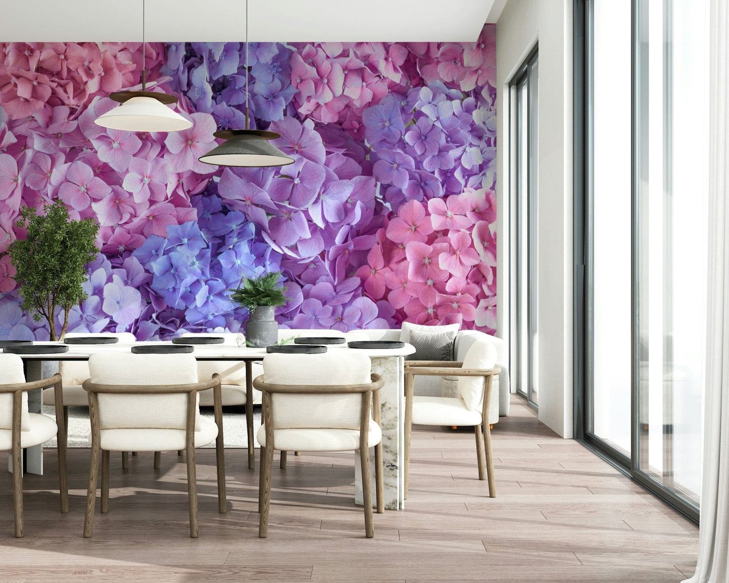 Hydrangea Hues wallpaper mural of pink and blue hydrangeas in a dining room with cream chairs and pendant lights