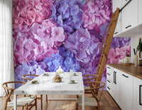 Hydrangea Hues wallpaper mural of hydrangea flowers in a kitchen with a marble table, wishbone chairs and wood ladder