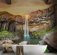 Iceland waterfall wallpaper mural with basalt columns.