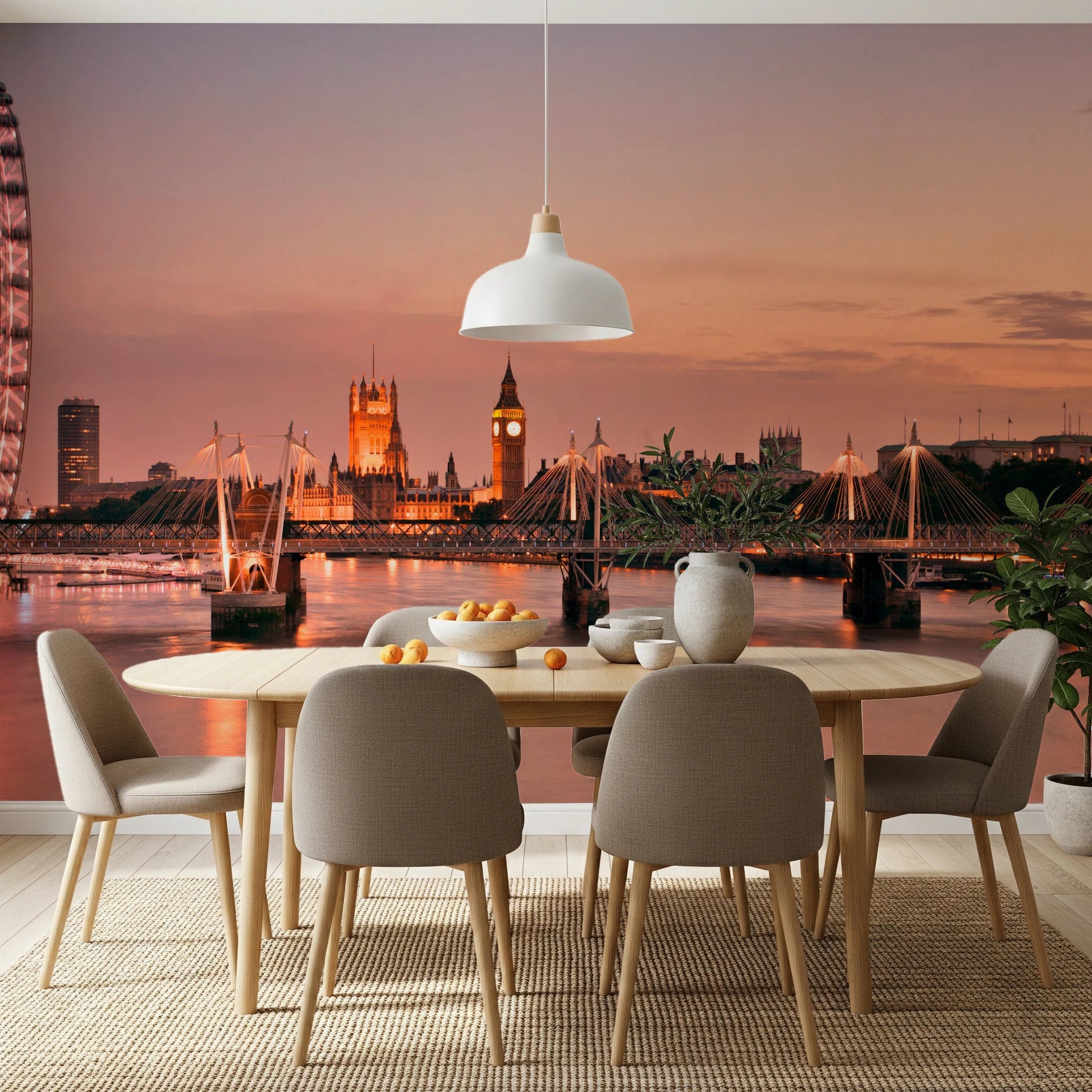 Iconic London at Dusk wall mural of Big Ben and bridges in a dining room with an oval wood table and taupe chairs